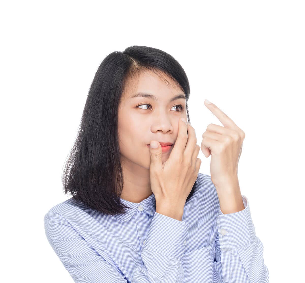 Woman inserting contact lens